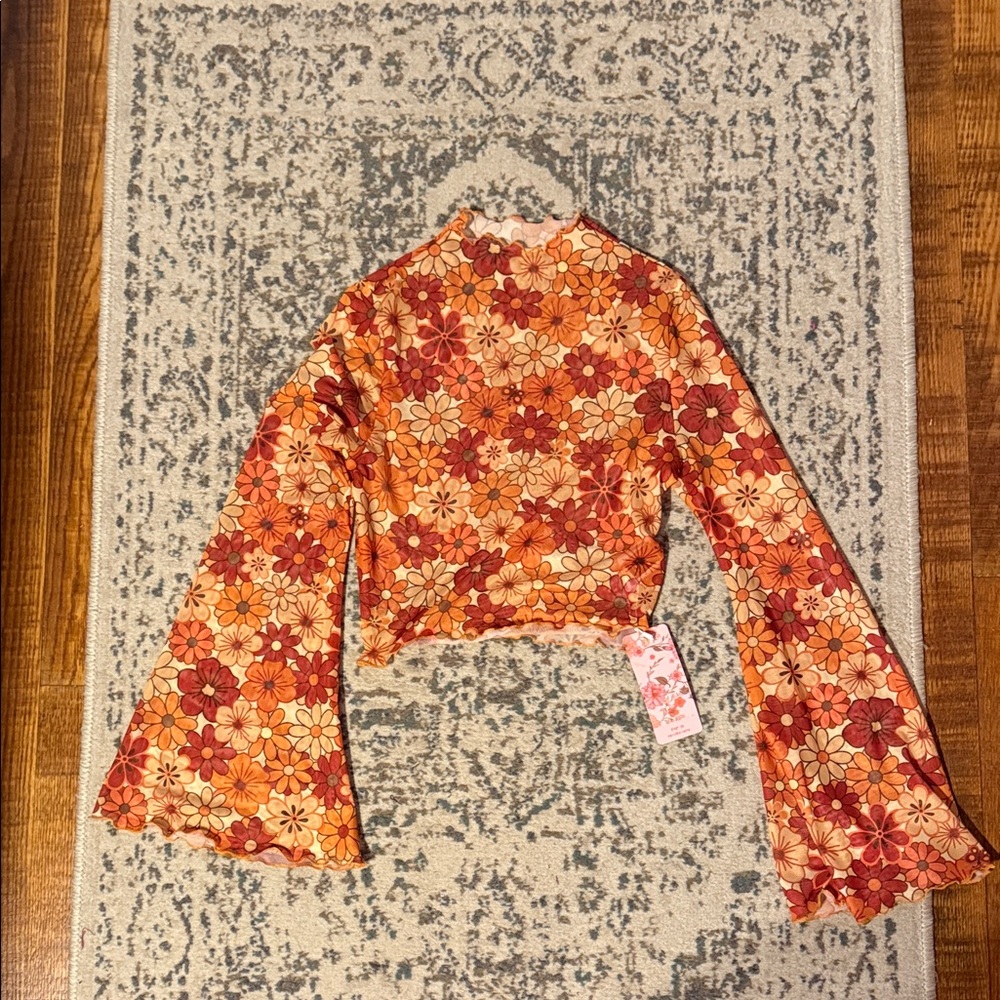 Floral bell sleeve top